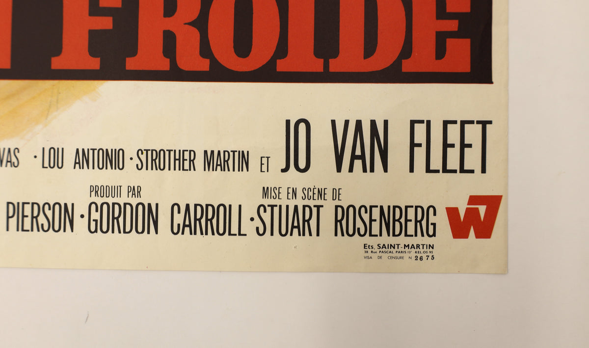 Detail of Cool Hand Luke French movie poster showing cast and production credits, French distributor information, and lower-right corner condition.