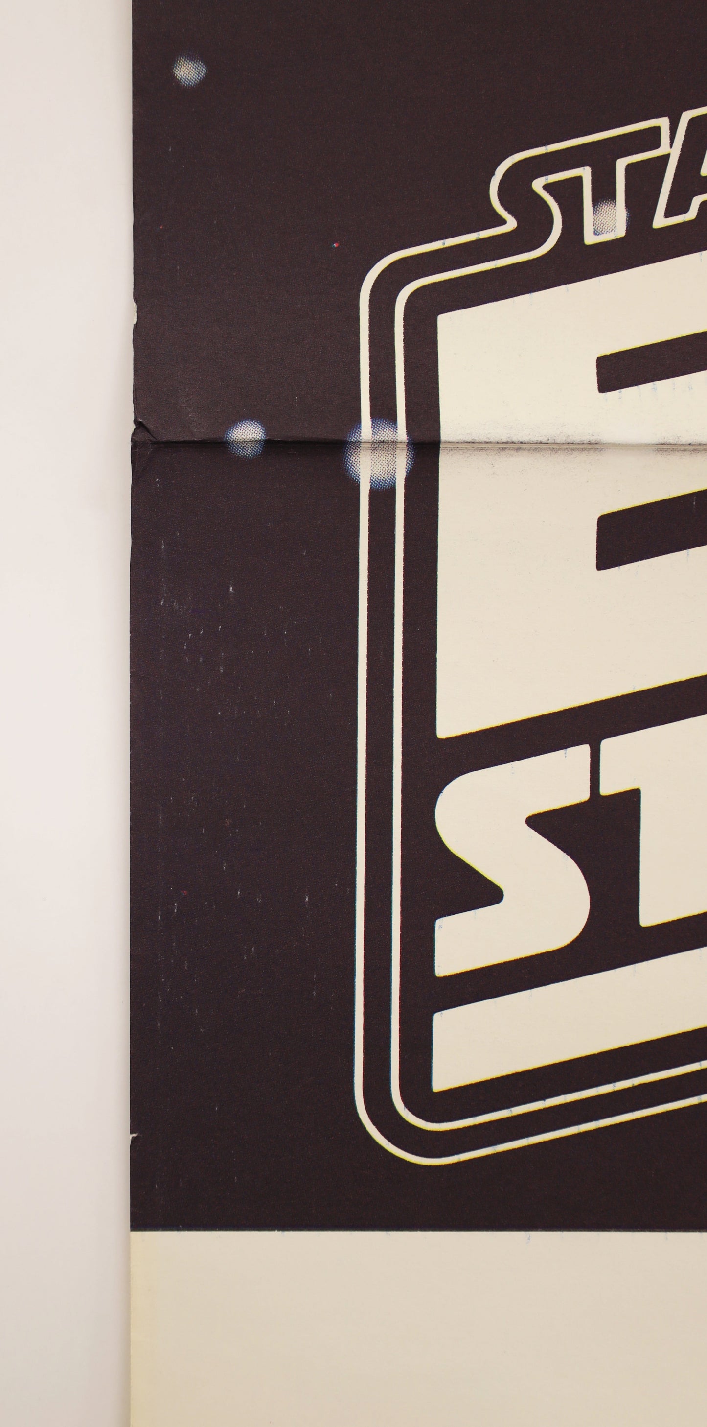 Title detail from original 1980 Star Wars: The Empire Strikes Back subway movie poster.