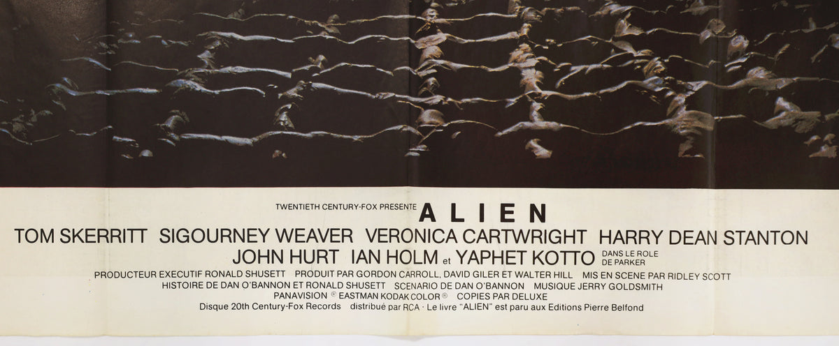 Close-up of the lower portion of the Alien poster showing the cast and production credits.