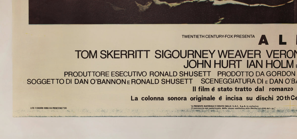 Detail of Alien Italian poster showing cast and production credits along the lower border.