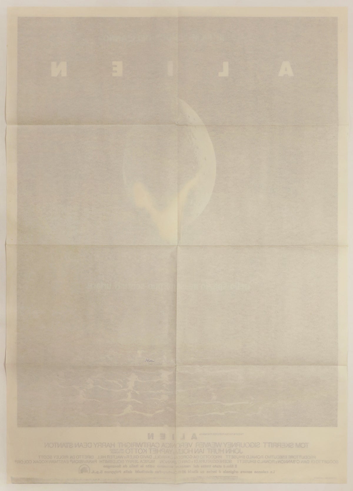 Reverse of original Alien 1979 Italian movie poster showing fold lines, light age toning, and handwritten notation.