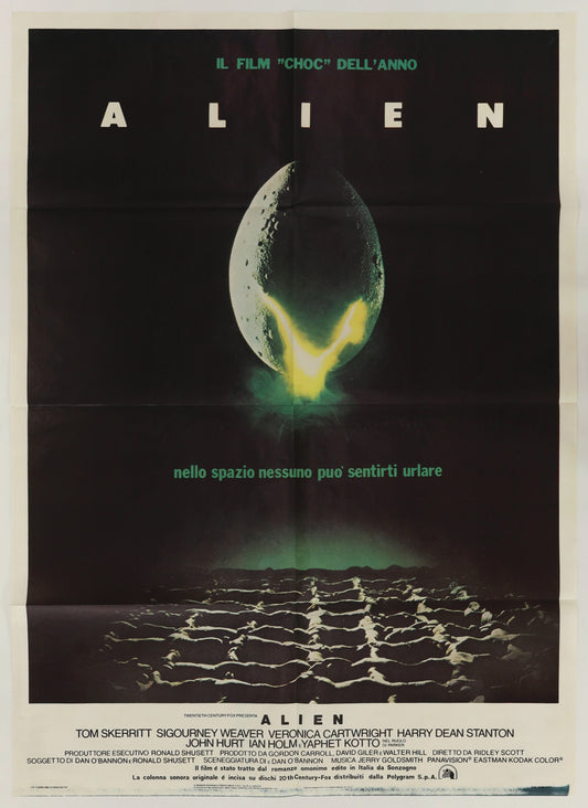 Original Alien 1979 Italian Due Fogli movie poster featuring the iconic glowing cracked egg against a black background with Italian text.