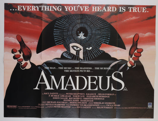Full front view of the original U.K. Quad Amadeus poster featuring the masked figure, red sky, large white title, Peter Sís artwork, and film credits.