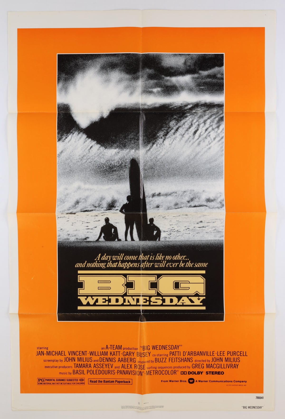 Full front view of the 1978 U.S. Big Wednesday one sheet featuring the orange background, black-and-white surfing image, tagline, title, cast credits, and Warner Bros. information.