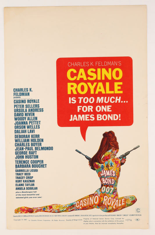 Full front view of the 1967 Casino Royale U.S. window card featuring Robert McGinnis artwork, James Bond imagery, colorful psychedelic design, cast credits, and Columbia Pictures information.
