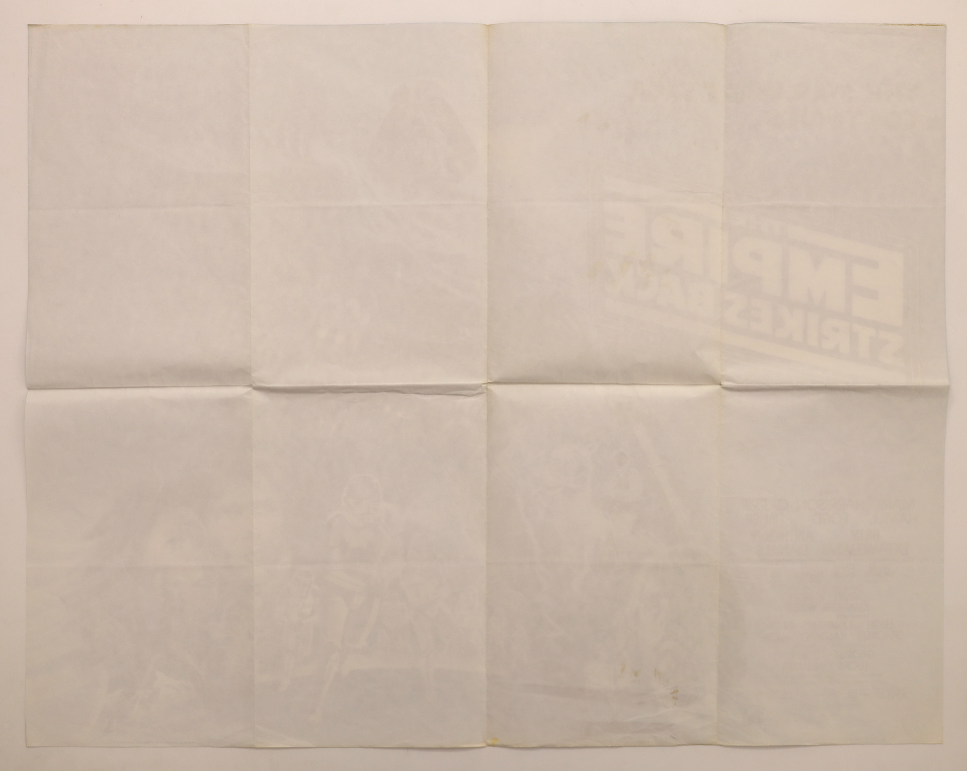 Back of original The Empire Strikes Back (1980) U.K. 30x40 movie poster showing original fold lines and reverse printing.