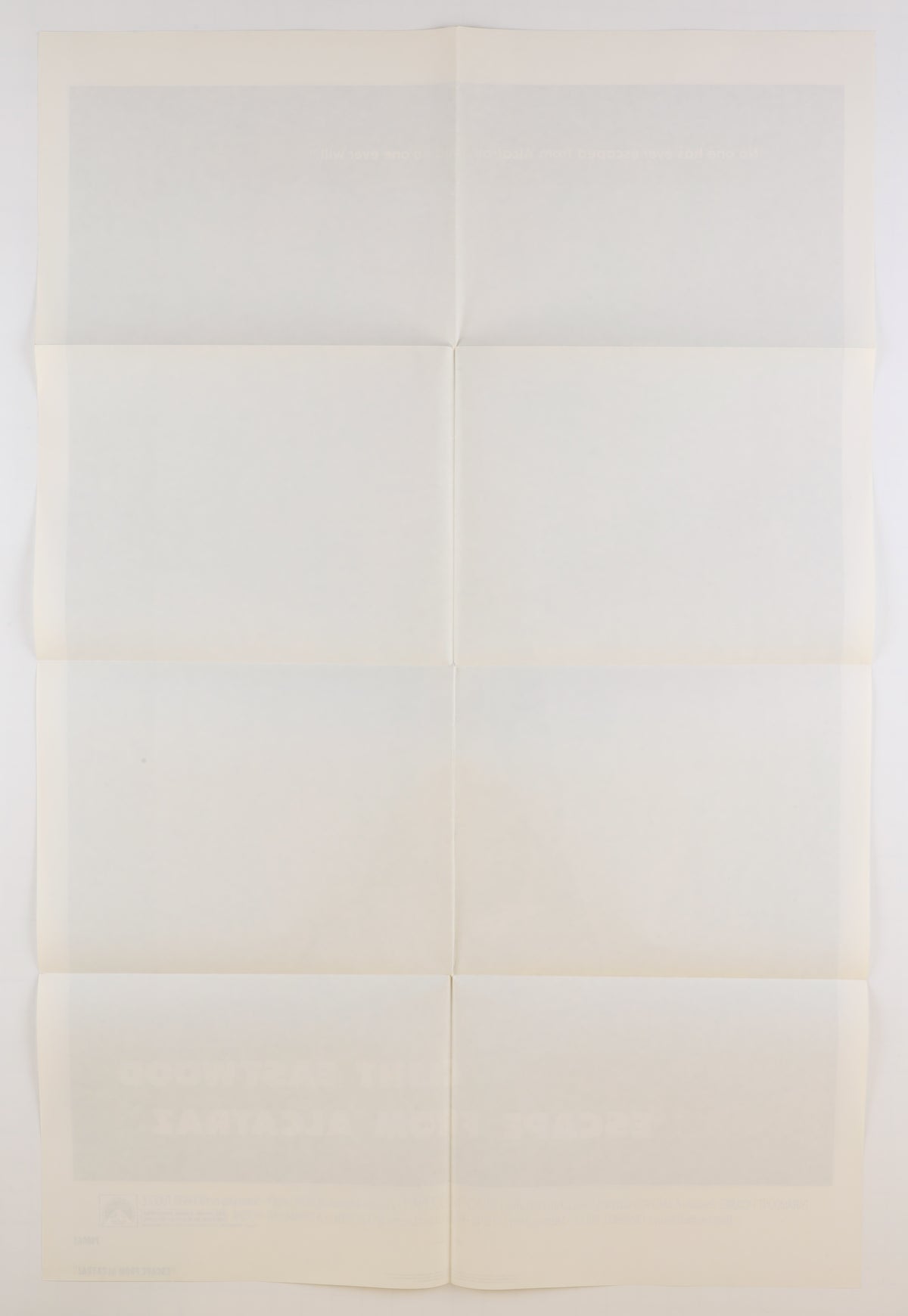 Reverse of a folded 1979 U.S. one sheet movie poster for Escape from Alcatraz, showing the horizontal and vertical fold pattern with light toning and faint image bleed-through.