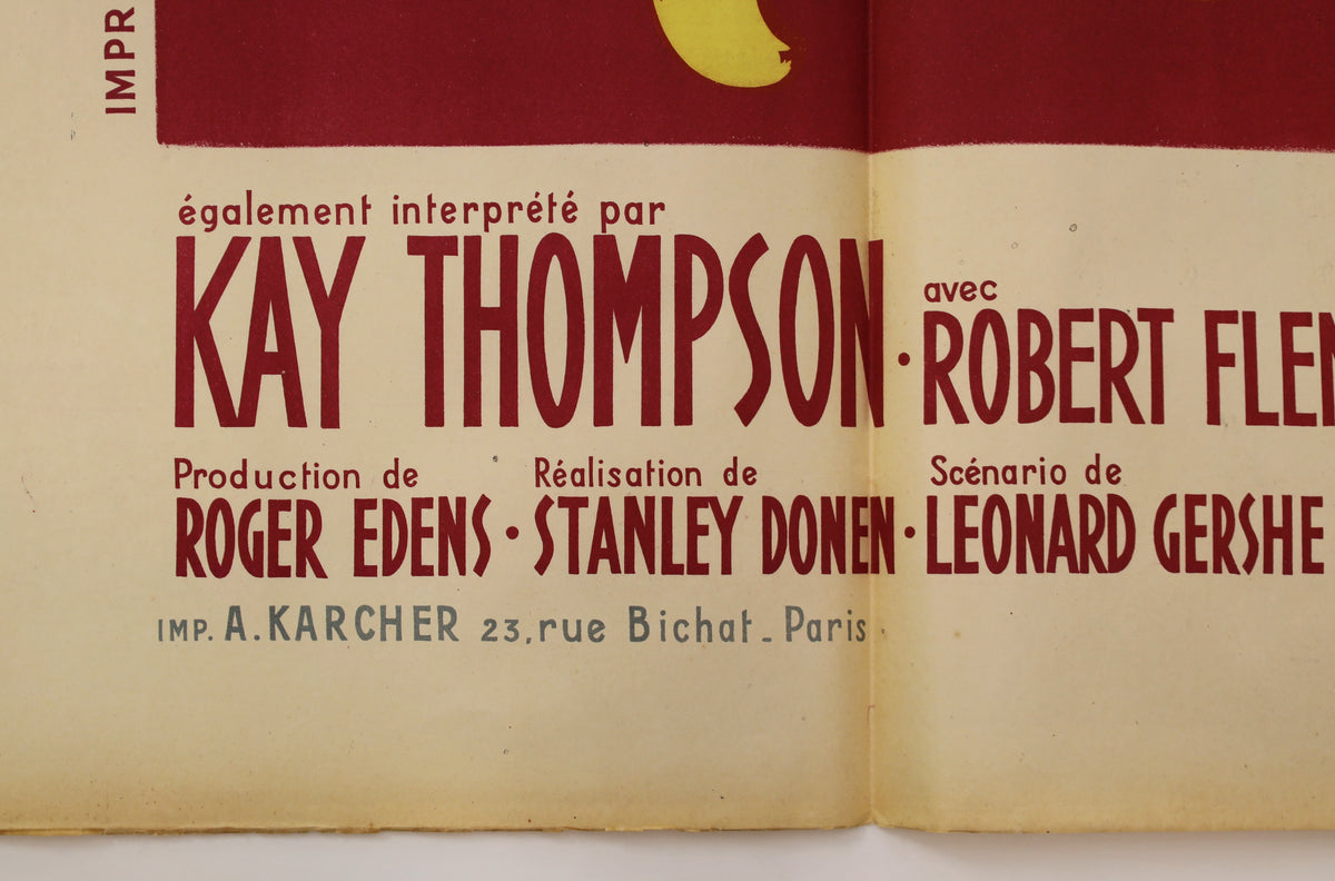 Close-up of lower poster credits showing Kay Thompson, Robert Flemyng, Roger Edens, Stanley Donen, and Leonard Gershe, with A. Karcher printer credit.