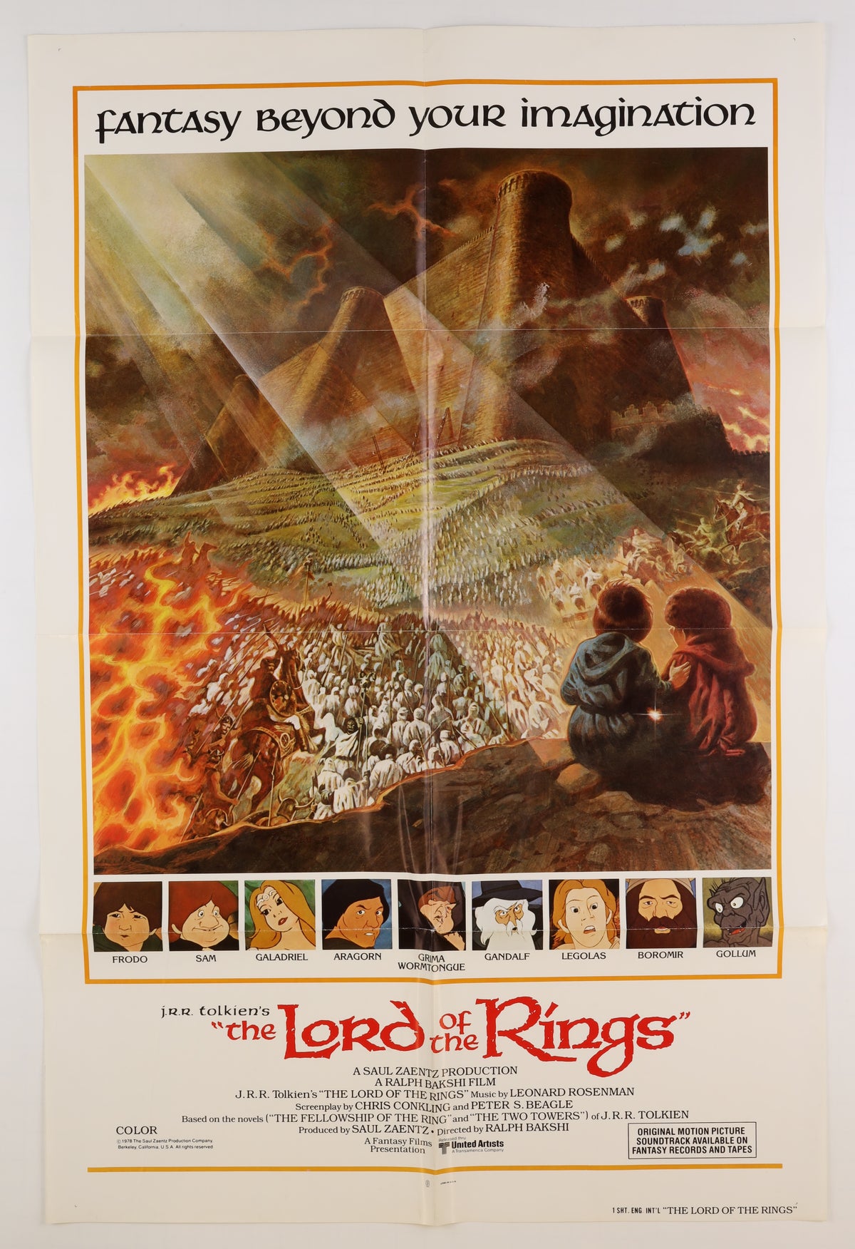 Front of the 1978 international one sheet for The Lord of the Rings, featuring Gandalf, Frodo, Sam, and other characters overlooking a fantasy battlefield and fortress, with Tom Jung artwork.
