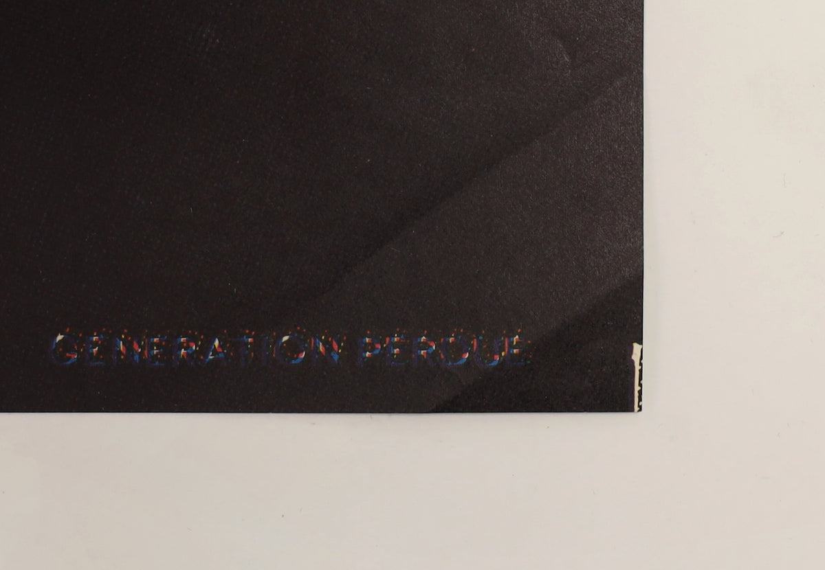 Close-up of lower-right corner of The Lost Boys French poster showing edge wear and printed production information.