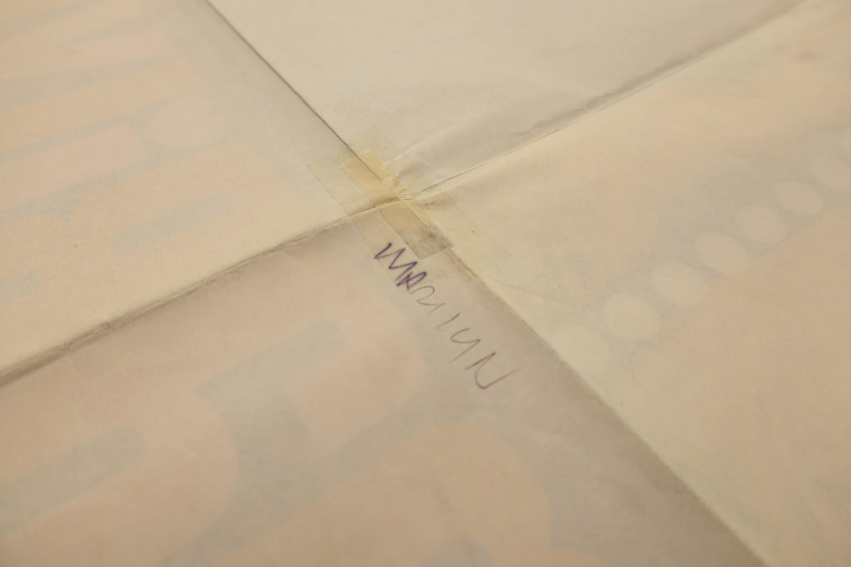 Reverse detail of the Marilyn 1963 one sheet poster showing tape reinforcement and wear at a central fold intersection.