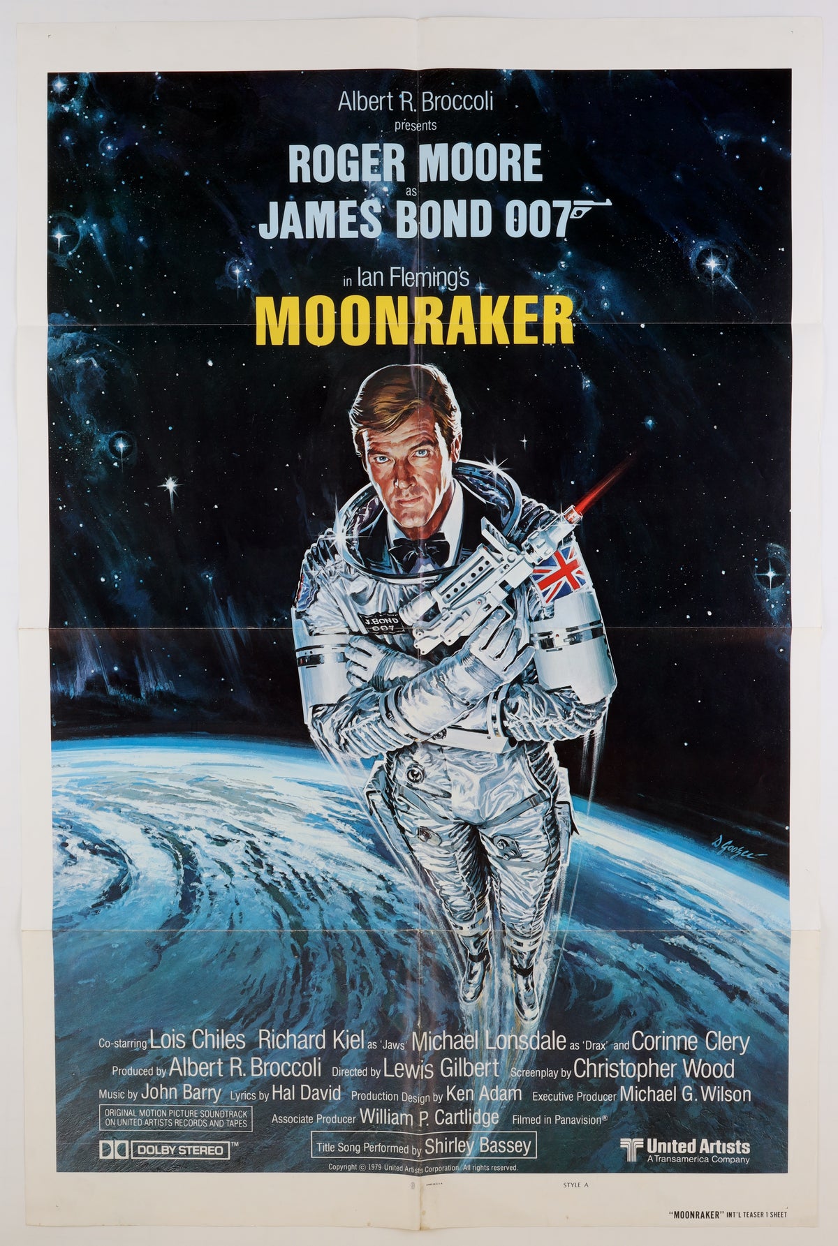 Front of the 1979 Moonraker international teaser Style A one sheet, featuring Roger Moore as James Bond in a spacesuit above Earth with Daniel Goozee artwork.
