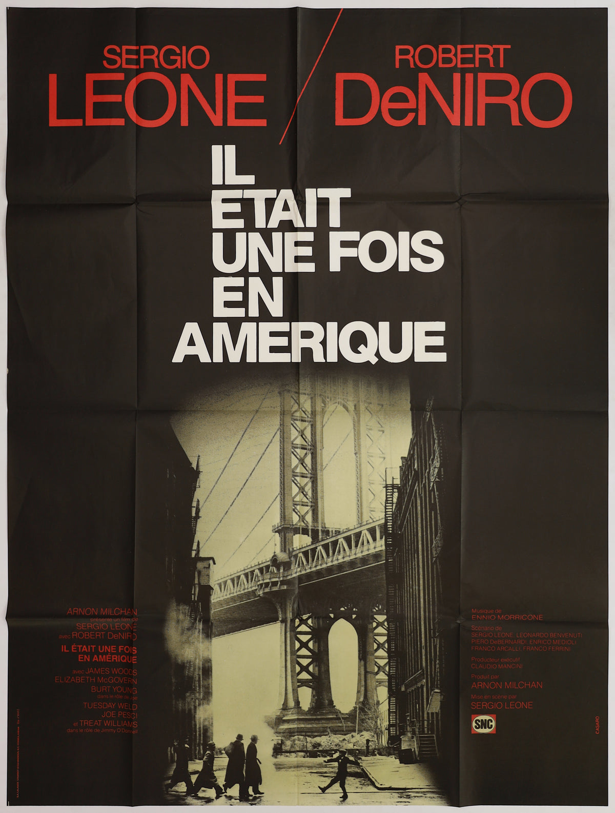 Full front view showing Robert De Niro and Sergio Leone names, the French title, Manhattan Bridge image, cast credits, and red-and-black Casaro design.