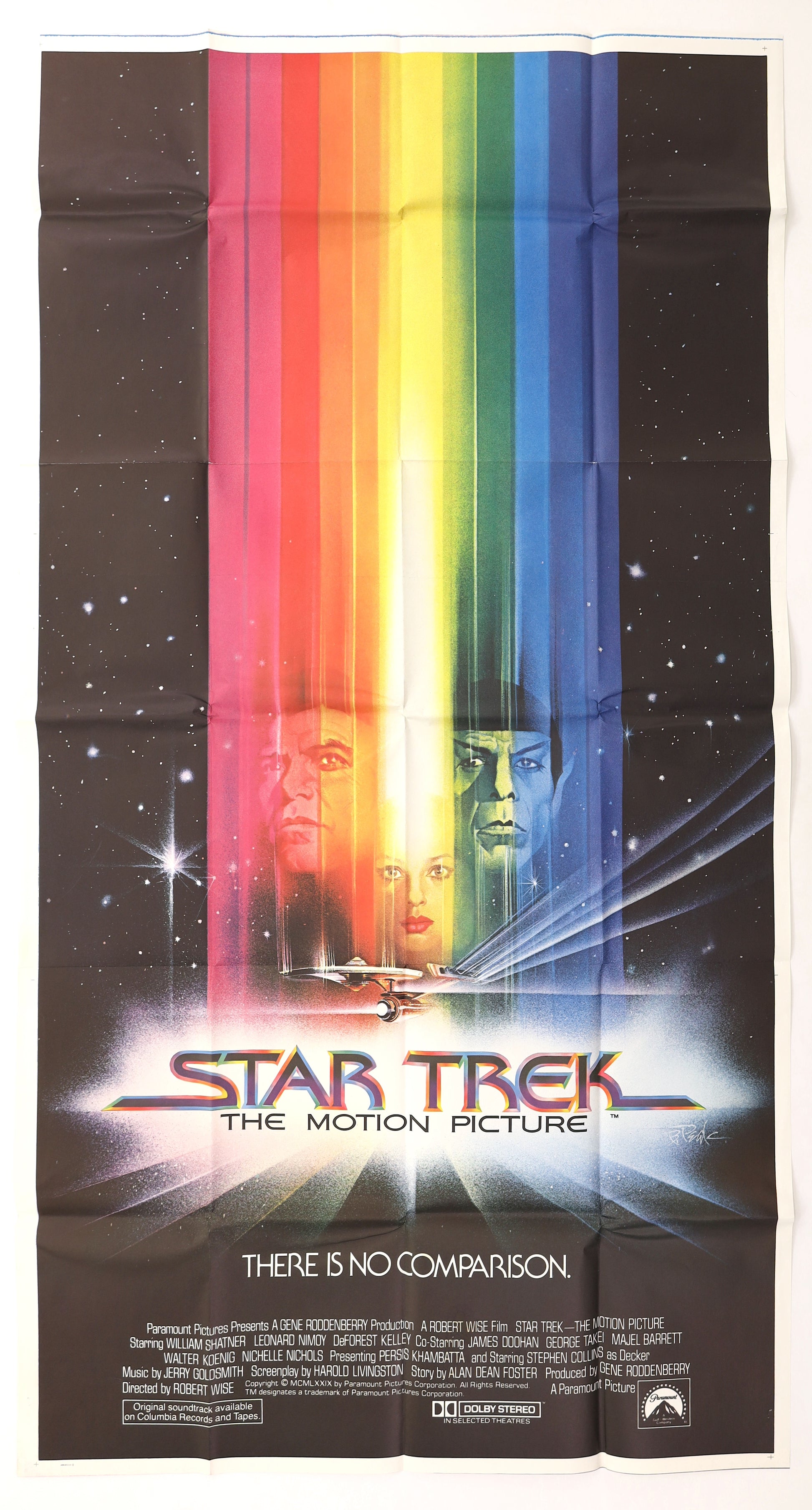 Original Star Trek: The Motion Picture 1979 international three sheet movie poster featuring the Enterprise, Kirk, Spock and Ilia beneath Bob Peak’s iconic rainbow space artwork.