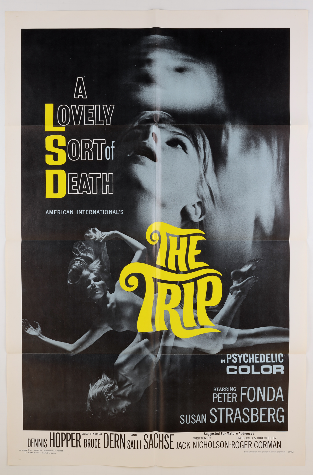 Full front view of the 1967 The Trip U.S. one sheet featuring psychedelic black-and-white imagery, bold yellow title lettering, Peter Fonda and Susan Strasberg credits, and American International Pictures information.