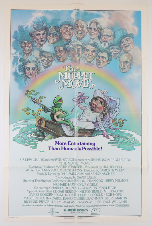 Front of 1979 U.S. one sheet for The Muppet Movie, featuring illustrated portraits of the Muppet characters and guest stars above Kermit and Miss Piggy in a boat, with film credits below.