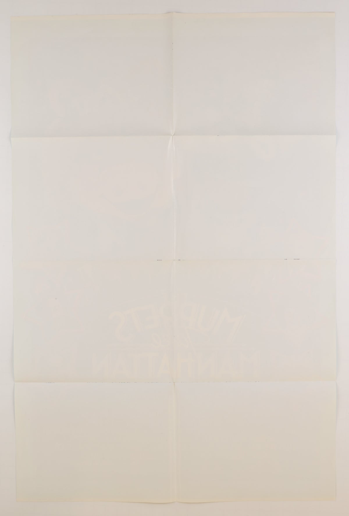 Reverse of the 1984 U.S. one sheet showing horizontal and vertical fold lines, light toning, and a few small marks near the folds.