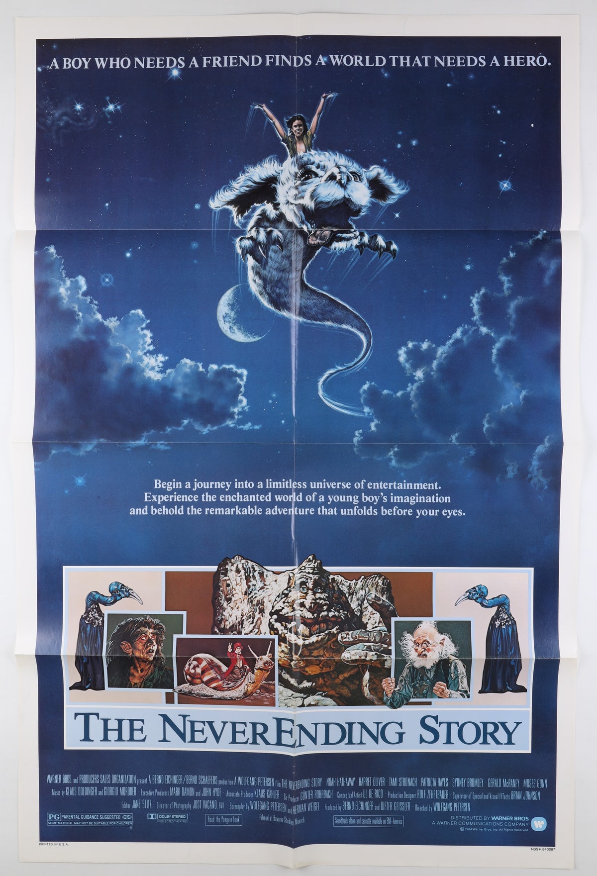 Front of a 1984 U.S. one sheet for The NeverEnding Story, featuring Atreyu riding Falkor beneath a starry sky with illustrated characters and the film title.