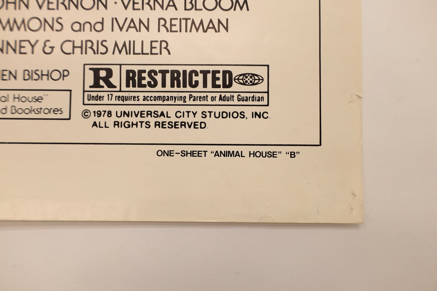 Detail of Animal House (1978) one sheet poster showing the R rating, 1978 Universal City Studios copyright, and Style B designation.