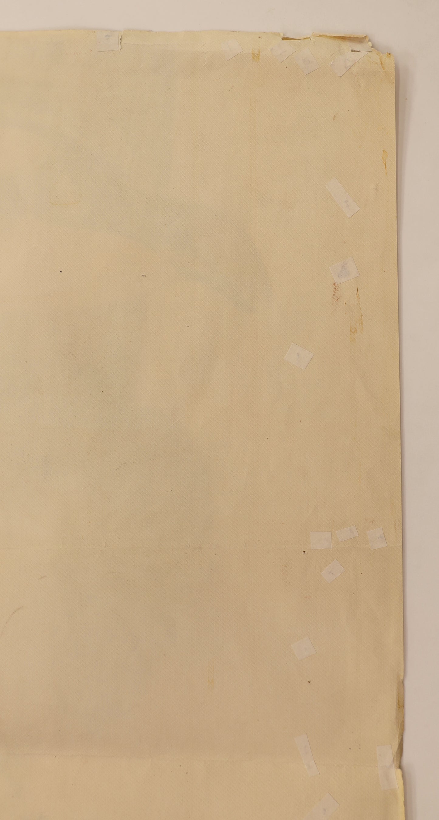Detail of the reverse of The Quiet Man 1952 three sheet poster showing multiple small tape pieces and paper patches along the edge and fold areas.